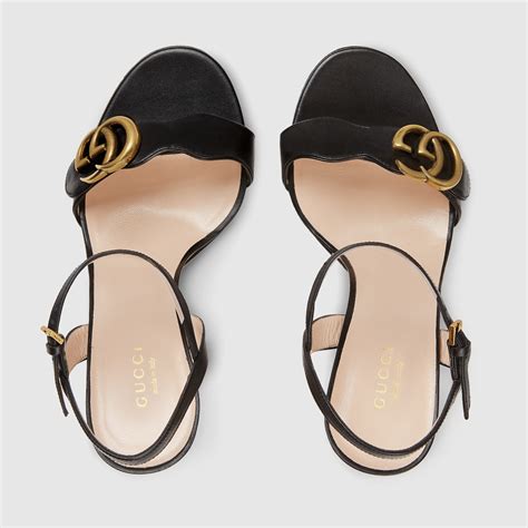 ladies black gucci sandals|Gucci black leather sandals.